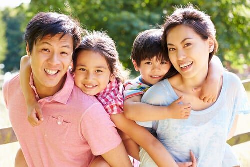 Asian family smiling